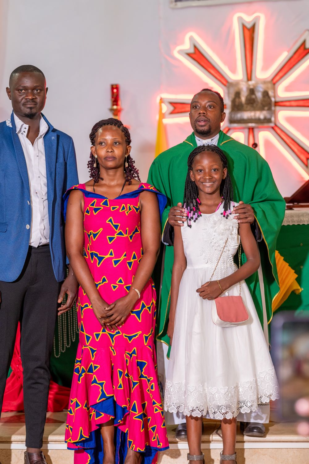 Family picture with priest